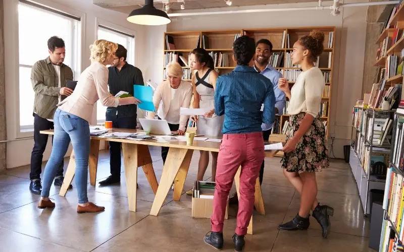 design team around a table strategizing